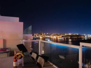 Balkón nebo terasa v ubytování Exceptional Tigne Seafront Apartments by Shortletsmalta