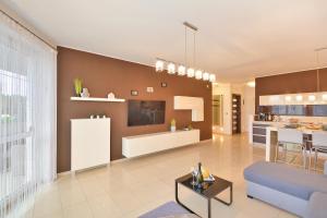 Η κουζίνα ή μικρή κουζίνα στο NORTH Apartments Muszelkowa 2