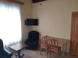 TV a/nebo společenská místnost v ubytování Simon-Dach-Haus
