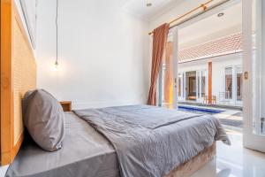 Lumturi House - Centrally Located房間的床