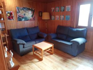 Posezení v ubytování Casa de Madera