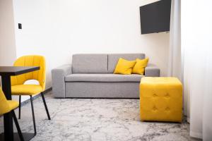 Posezení v ubytování Szlakami 5 Dolin - apartamenty obok Doliny Strążyskiej - sauna i parking GRATIS!