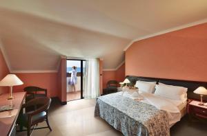 Postel nebo postele na pokoji v ubytování Hotel Schuhmann