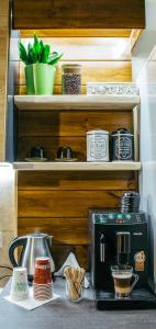 a kitchen with a coffee maker on a counter at Casa Traian in Sinaia