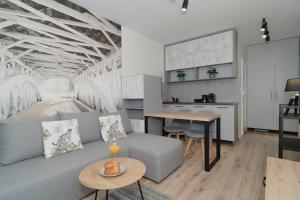 Χώρος καθιστικού στο TOTU HOME Deluxe Apartments Browar Gdański