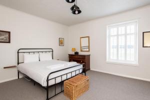 a bedroom with a bed and a window at River-Twine in Croxdale