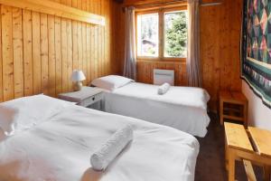 Katil atau katil-katil dalam bilik di Chalet Charousse