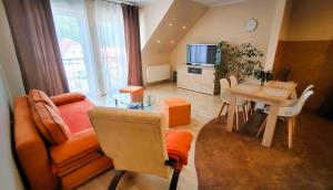 Posedenie v ubytovaní Apartament w Kamienicy na Kłodzkiej
