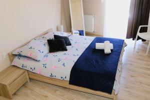 Posteľ alebo postele v izbe v ubytovaní Apartament w Kamienicy na Kłodzkiej