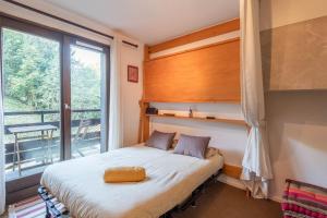 Postel nebo postele na pokoji v ubytování SmartStay Emeraude - Saint-Gervais