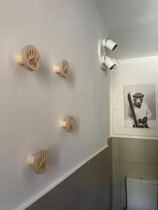 a bathroom with a picture of a baseball player on the wall at CASTEL ISARD - Le Refuge in Porté-Puymorens