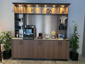 Příslušenství pro přípravu čaje a kávy v ubytování City Central Hotel Örebro by First Hotels