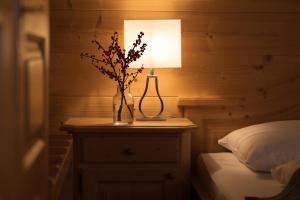 Ein Bett oder Betten in einem Zimmer der Unterkunft Almgasthof Windischgrätz