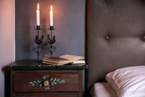 Ein Bett oder Betten in einem Zimmer der Unterkunft Almgasthof Windischgrätz