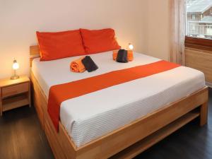 Postel nebo postele na pokoji v ubytování Apartment Rossignol B by Interhome