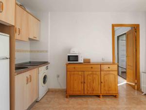 Kuchyň nebo kuchyňský kout v ubytování Apartment Miramar IV by Interhome + 10 fotografií