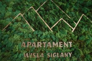 Un certificado, premio, letrero u otro documento en Apartament Wisła Siglany