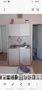 Kuchyň nebo kuchyňský kout v ubytování Villa Palfi