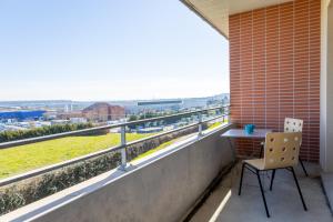 A balcony or terrace at Le Beluga – Appartement proche Airbus