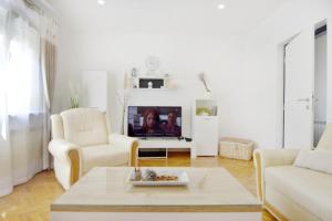 TV a/nebo společenská místnost v ubytování Apartment Diva