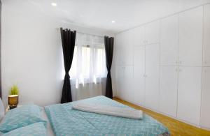 Postel nebo postele na pokoji v ubytování Apartment Diva