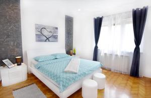 Postel nebo postele na pokoji v ubytování Apartment Diva