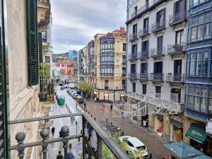 a view of a street in a city with buildings at GRAN VÍA Bilbao by ALOHA Bilbao in Bilbao