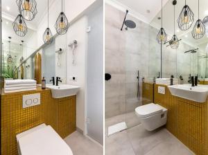 ein Badezimmer mit zwei Waschbecken, einem WC und einer Dusche in der Unterkunft Rent like home - Gagarina 33 in Warschau