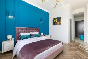 Posteľ alebo postele v izbe v ubytovaní Gagarina 33 - Colorful Studio by Noclegi Renters