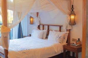 A bed or beds in a room at Mount View Cottage