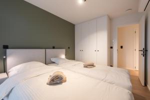Postel nebo postele na pokoji v ubytování NIEUW - De Grenspaal OOST 7P - 3SLPK - SAUNA - LAADPAAL