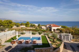 Swimmingpoolen hos eller tæt på Cavos Boutique Homes