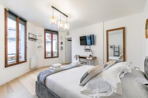 Posteľ alebo postele v izbe v ubytovaní MBA Splendide Appart Diderot 2 - Proche Vincennes