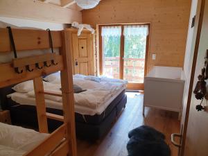 Postel nebo postele na pokoji v ubytování Appartement Nendaz Chardon Bleu