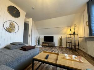 Μια τηλεόραση ή/και κέντρο ψυχαγωγίας στο RB City Apartments Emden am Wall 3