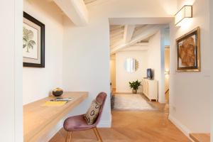 a home office with a desk and a chair at Giotto Suite With View in Florence