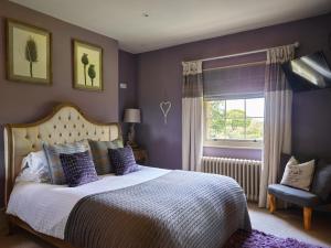 Ένα ή περισσότερα κρεβάτια σε δωμάτιο στο Willington Lodge +86 φωτογραφίες