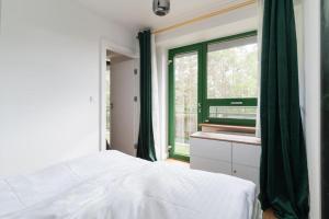 Postel nebo postele na pokoji v ubytování Holi Resort