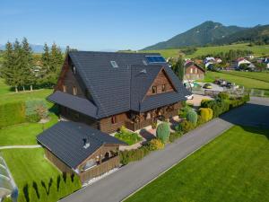 an overhead view of a house with a roof at Drevenica pod Sitieňom 1 in Lazisko