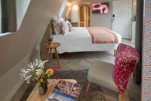 Postel nebo postele na pokoji v ubytování Hôtel Vic Eiffel + 37 fotografií