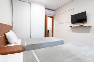 Ліжко або ліжка в номері VIVARIUM APART HOTEL