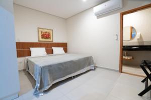 Ліжко або ліжка в номері VIVARIUM APART HOTEL