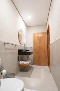 Ванна кімната в VIVARIUM APART HOTEL