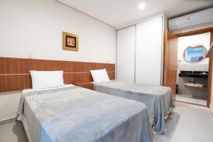 Ліжко або ліжка в номері VIVARIUM APART HOTEL