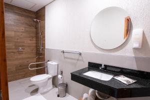 Ванна кімната в VIVARIUM APART HOTEL
