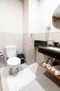 Ванна кімната в VIVARIUM APART HOTEL