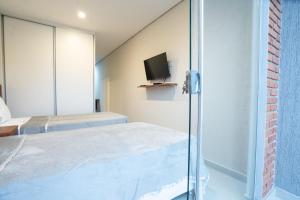 Ліжко або ліжка в номері VIVARIUM APART HOTEL