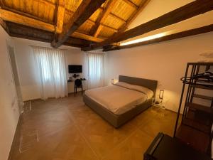 Postel nebo postele na pokoji v ubytování Marin Traghetto - Locazione Turistica