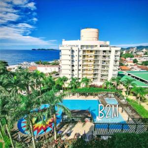 an aerial view of the bmw hotel and resort at Beto Carrero, vista Espetacular do mar, Home Club in Penha