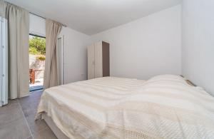 Ein Bett oder Betten in einem Zimmer der Unterkunft Villa Stella Adriatica